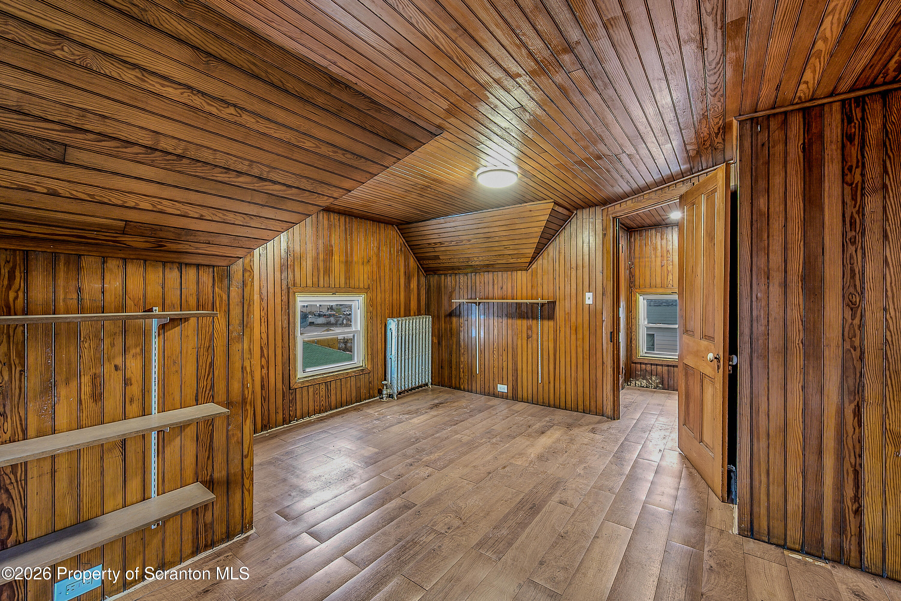 905 Albright Avenue Scranton, PA 18508 - Photo 42 of 56 a view of a porch with wooden floor and stairs