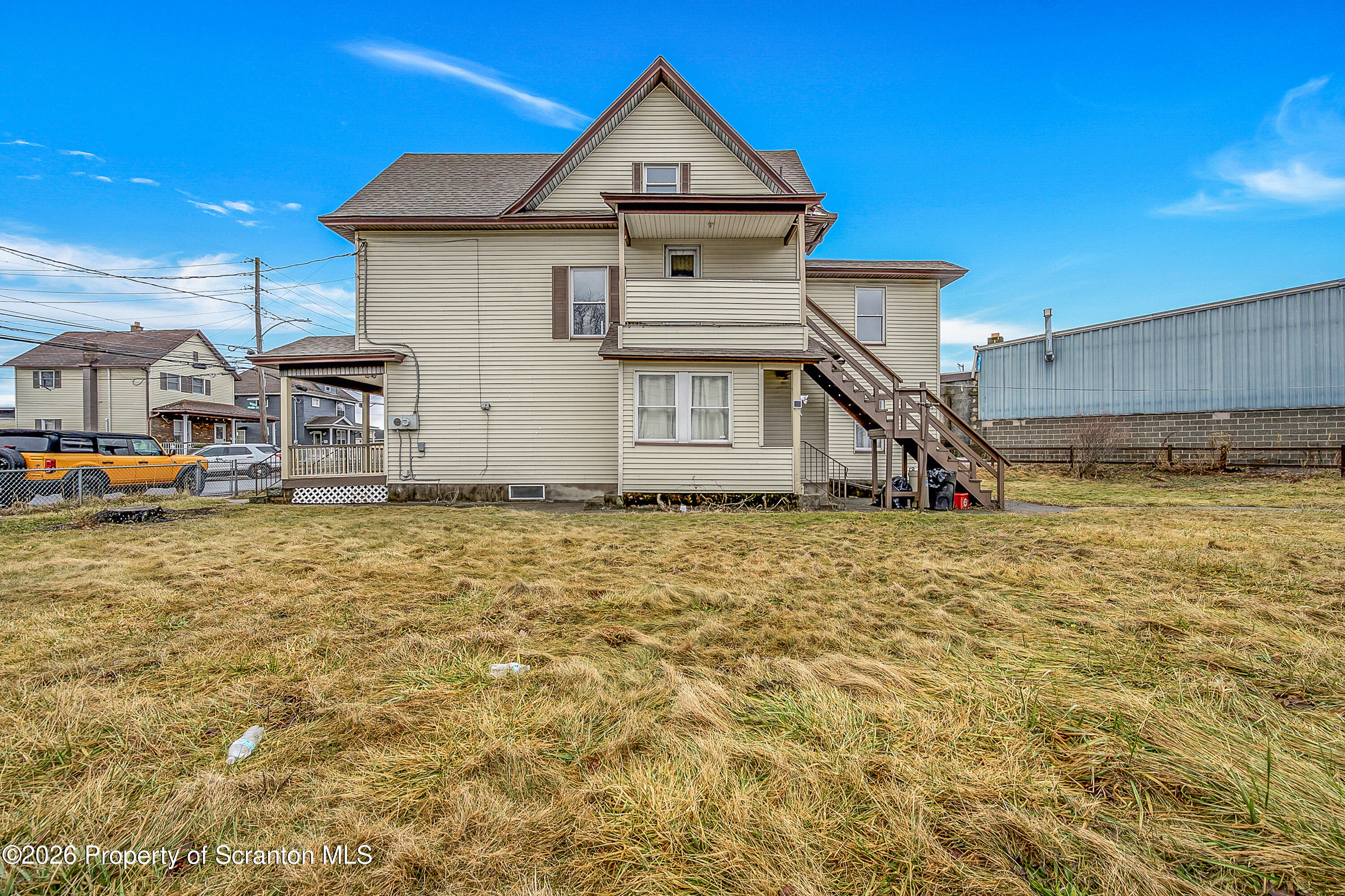 905 Albright Avenue Scranton, PA 18508 - Photo 5 of 56 a view of a house with a yard
