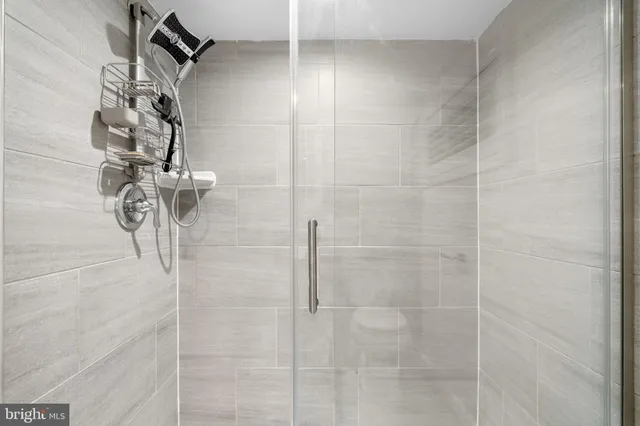 a view of a hallway with washer and dryer