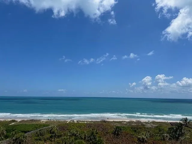 a view of an ocean and beach