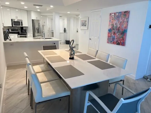 a view of a dining room with furniture
