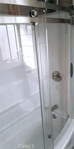 a bathroom with a bathtub