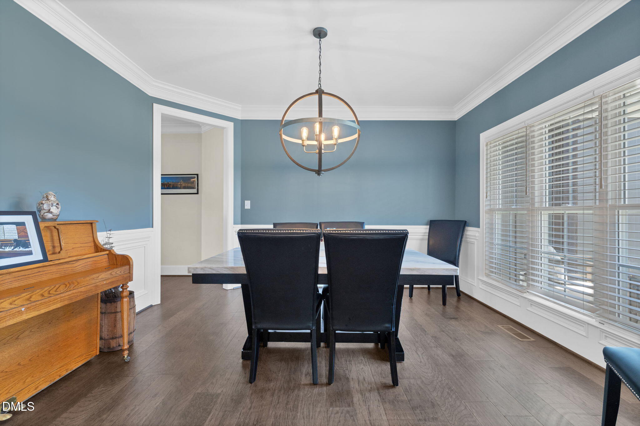 106 Garrison Farm Road Mebane, NC 27302 - Photo 14 of 46 a view of a dining room with furniture window and wooden floor