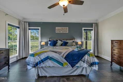 a living room with furniture and a bathtub