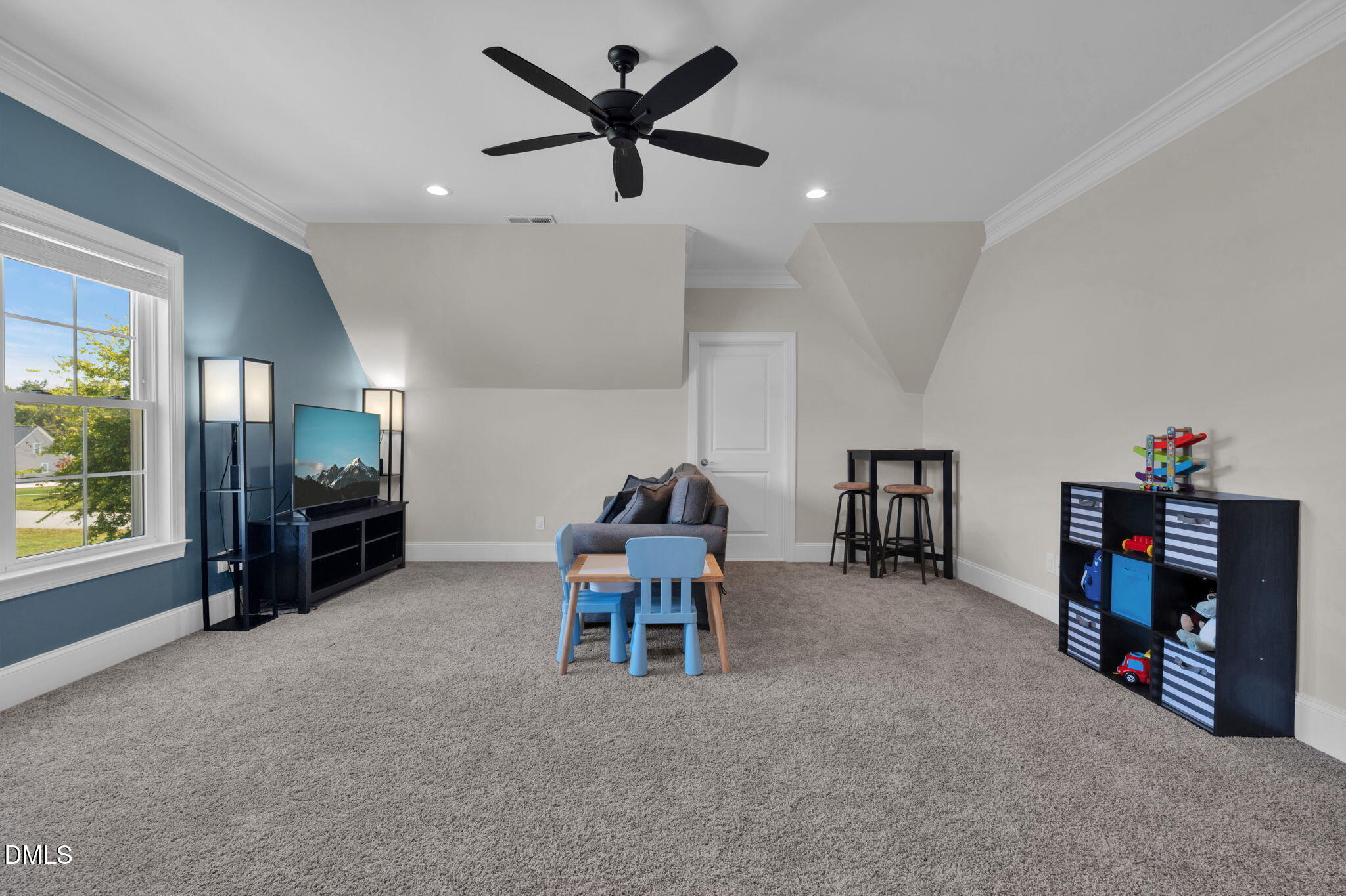 106 Garrison Farm Road Mebane, NC 27302 - Photo 28 of 46 a living room with furniture and a flat screen tv