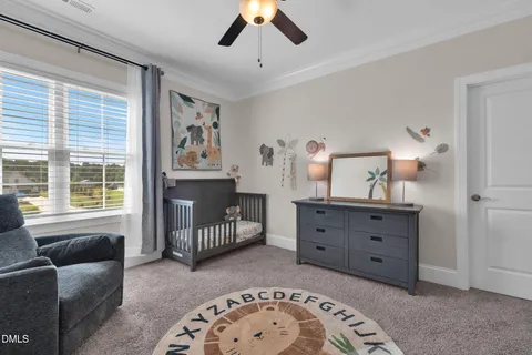 a bathroom with a sink double vanity and a mirror