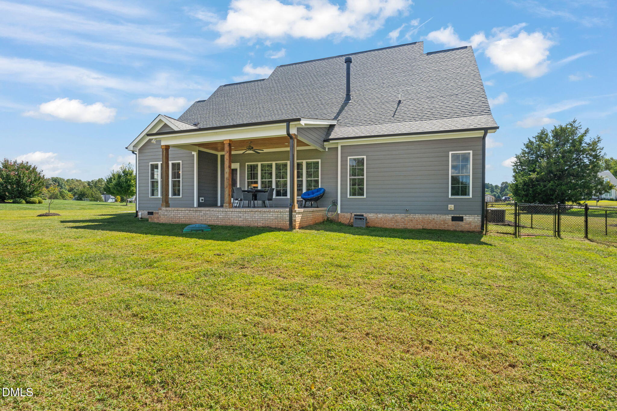 106 Garrison Farm Road Mebane, NC 27302 - Photo 40 of 46 a view of a house with a yard