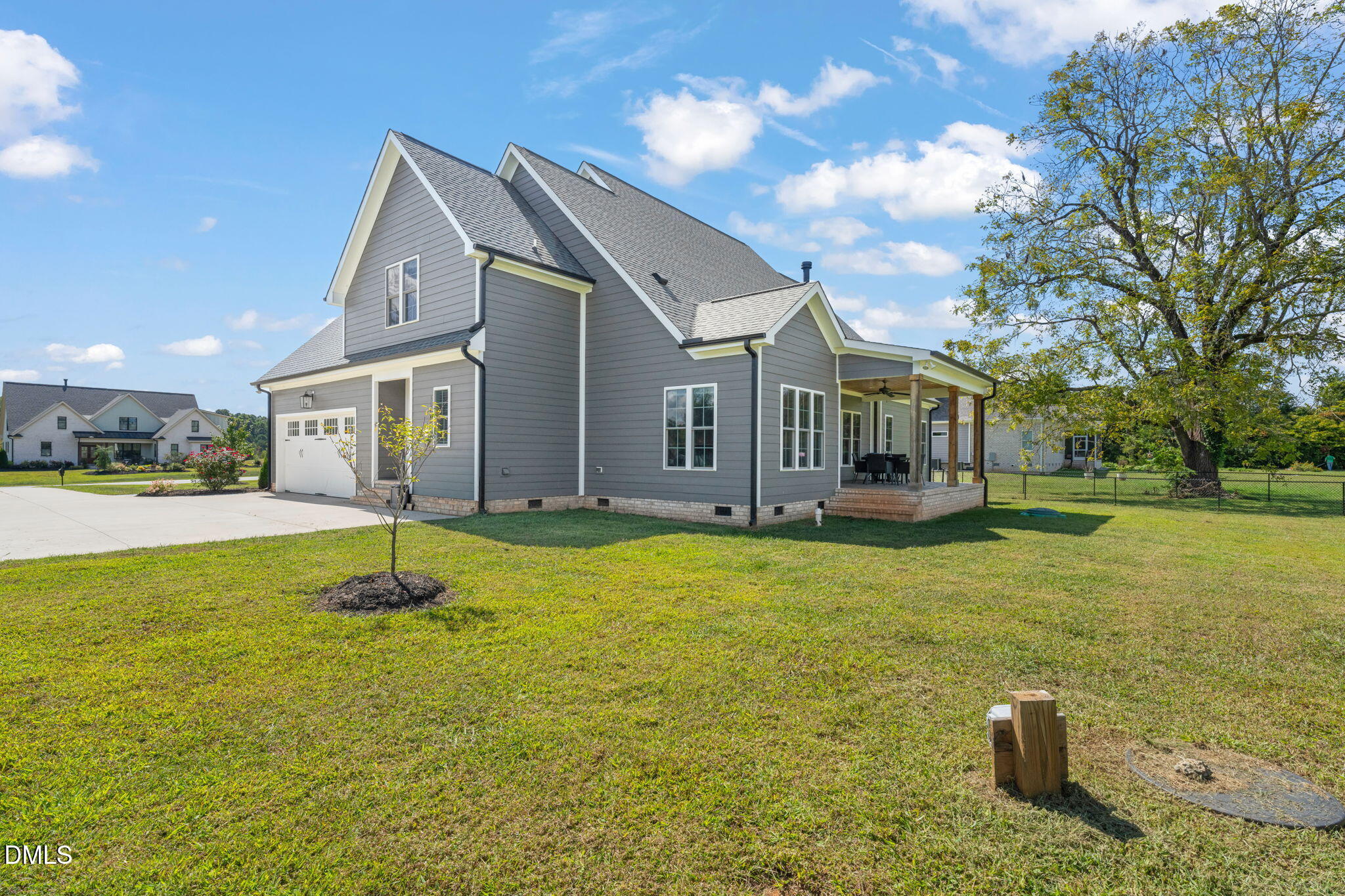 106 Garrison Farm Road Mebane, NC 27302 - Photo 41 of 46 a front view of a house with a yard