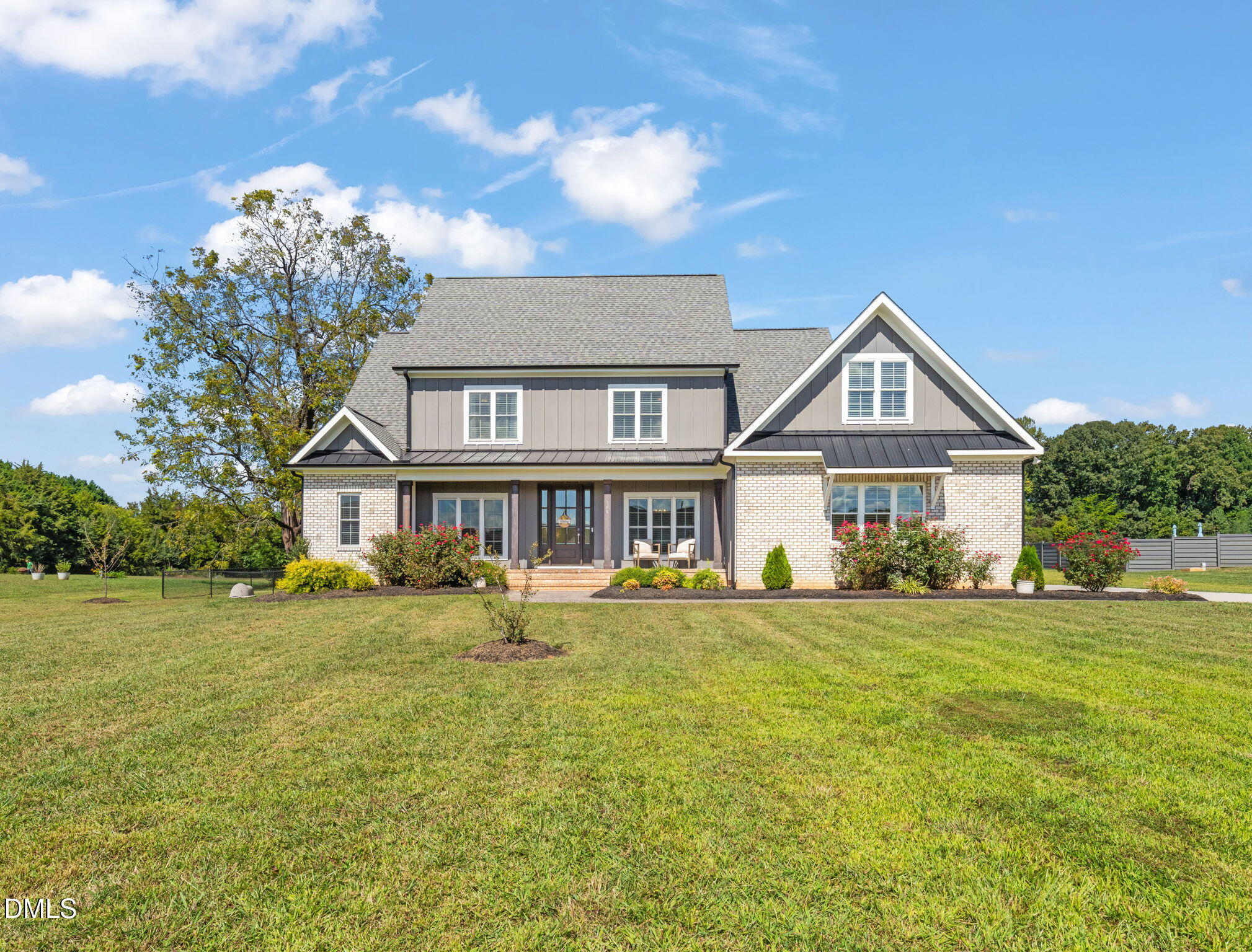 106 Garrison Farm Road Mebane, NC 27302 - Photo 44 of 46 a front view of a house with a yard
