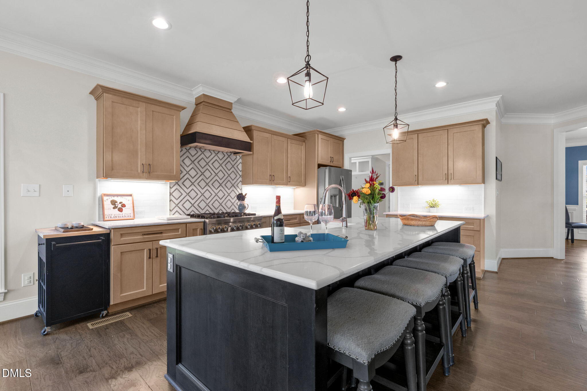 106 Garrison Farm Road Mebane, NC 27302 - Photo 6 of 46 a kitchen with a stove a refrigerator a sink and chairs