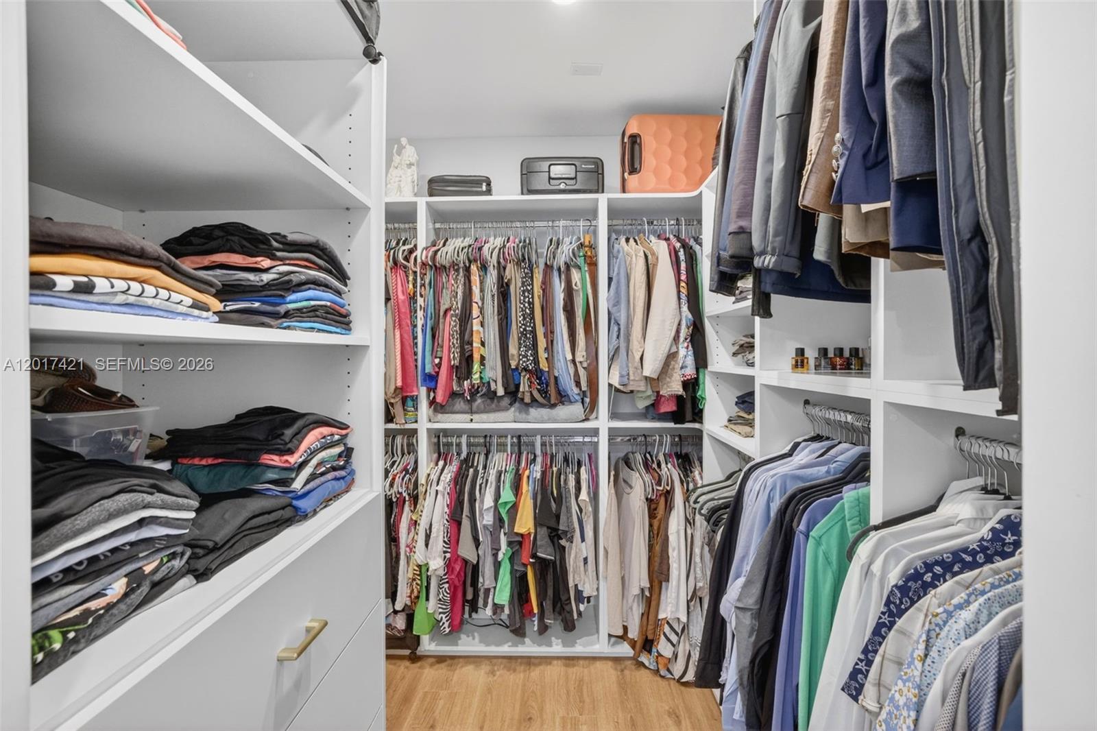 3848 Atlanta Street Hollywood, FL 33021 - Photo 40 of 79 Gorgeous custom walk in closet in primary bedroom