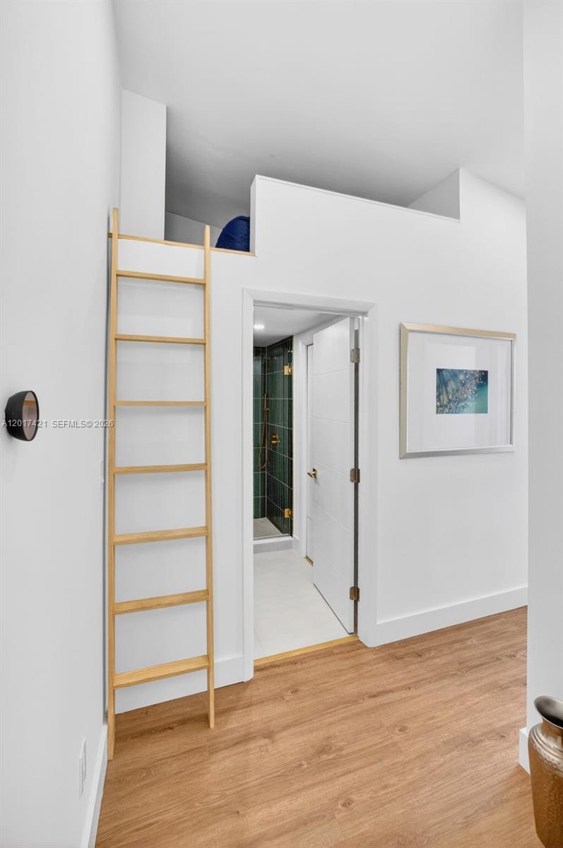 3848 Atlanta Street Hollywood, FL 33021 - Photo 54 of 79 Another view of the ladder to go up to hideaway / storage area