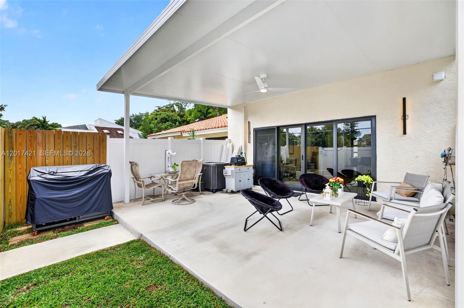 3848 Atlanta Street Hollywood, FL 33021 - Photo 56 of 79 Everything was thought of. You'll have a space for your grill and a bit of grass for your dog
