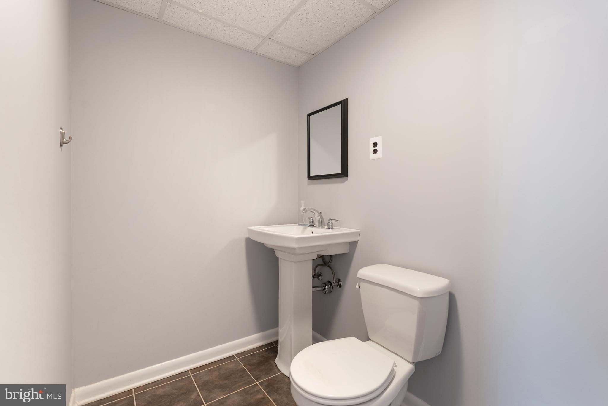 4610 Ballygar Road Baltimore, MD 21236 - Photo 25 of 35 Lower Level Half Bathroom