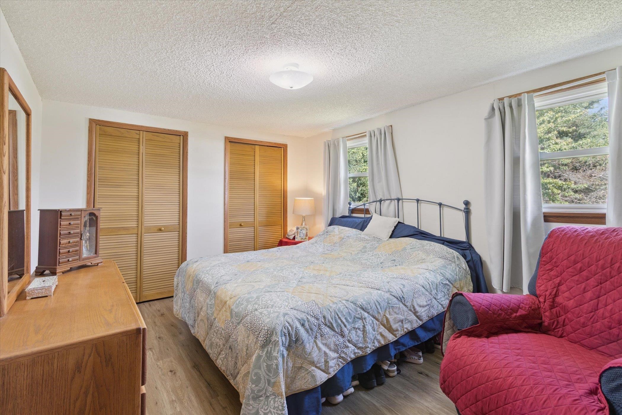 976 East Cedarville Road Freeport, IL 61032 - Photo 20 of 48 a bedroom with a bed couch and a window