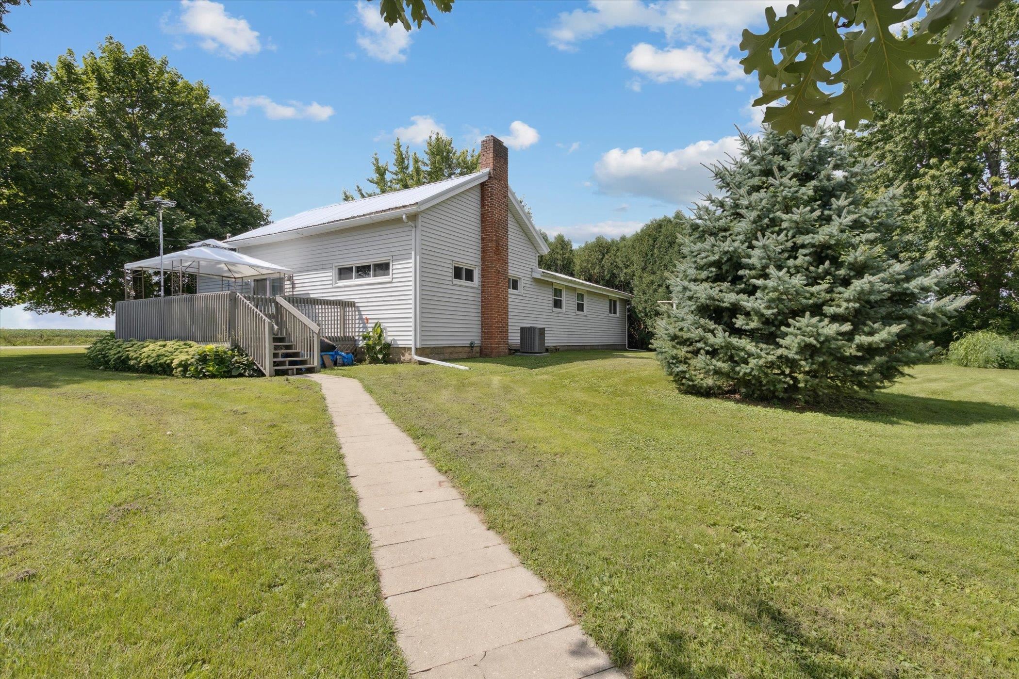 976 East Cedarville Road Freeport, IL 61032 - Photo 40 of 48 a view of a house with a yard