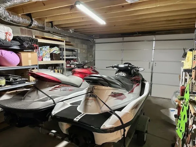 an aerial view of a houses with a yard