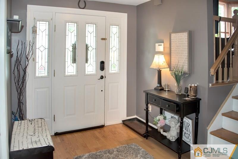 18 Chelsea Road Old Bridge, NJ 08857 - Photo 2 of 25 a view of hall way with furniture and a window