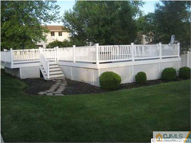 18 Chelsea Road Old Bridge, NJ 08857 - Photo 22 of 25 a view of a house with a backyard