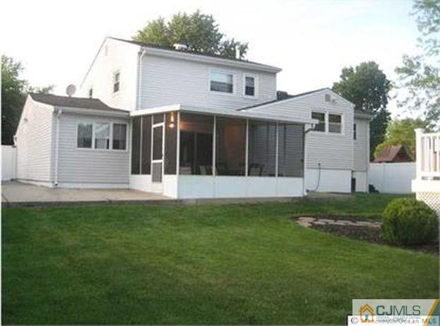 18 Chelsea Road Old Bridge, NJ 08857 - Photo 23 of 25 a view of a house with backyard