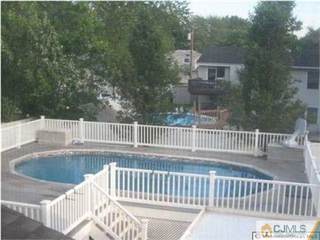 18 Chelsea Road Old Bridge, NJ 08857 - Photo 25 of 25 a view of a balcony with small garden