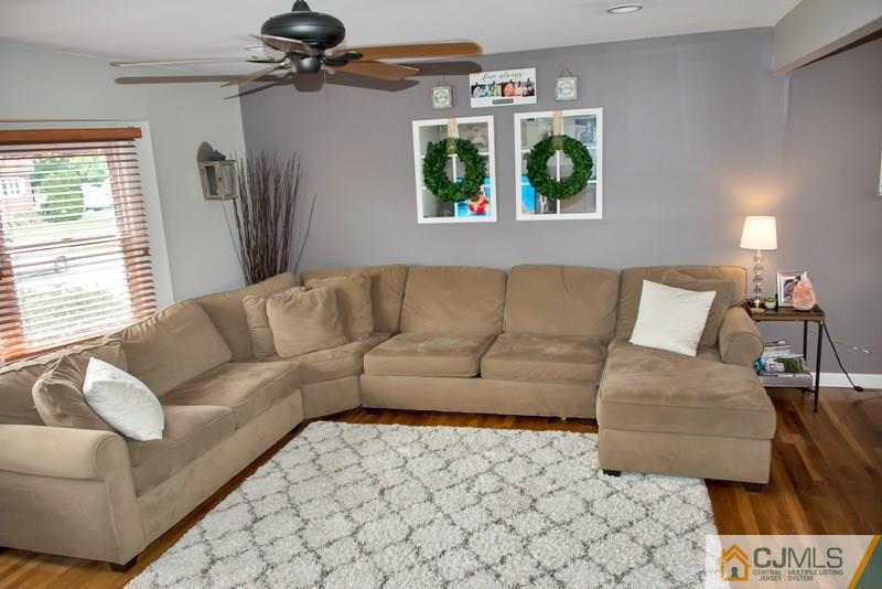 18 Chelsea Road Old Bridge, NJ 08857 - Photo 10 of 25 a living room with furniture and a window