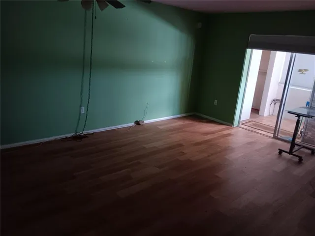 a view of a room with a door