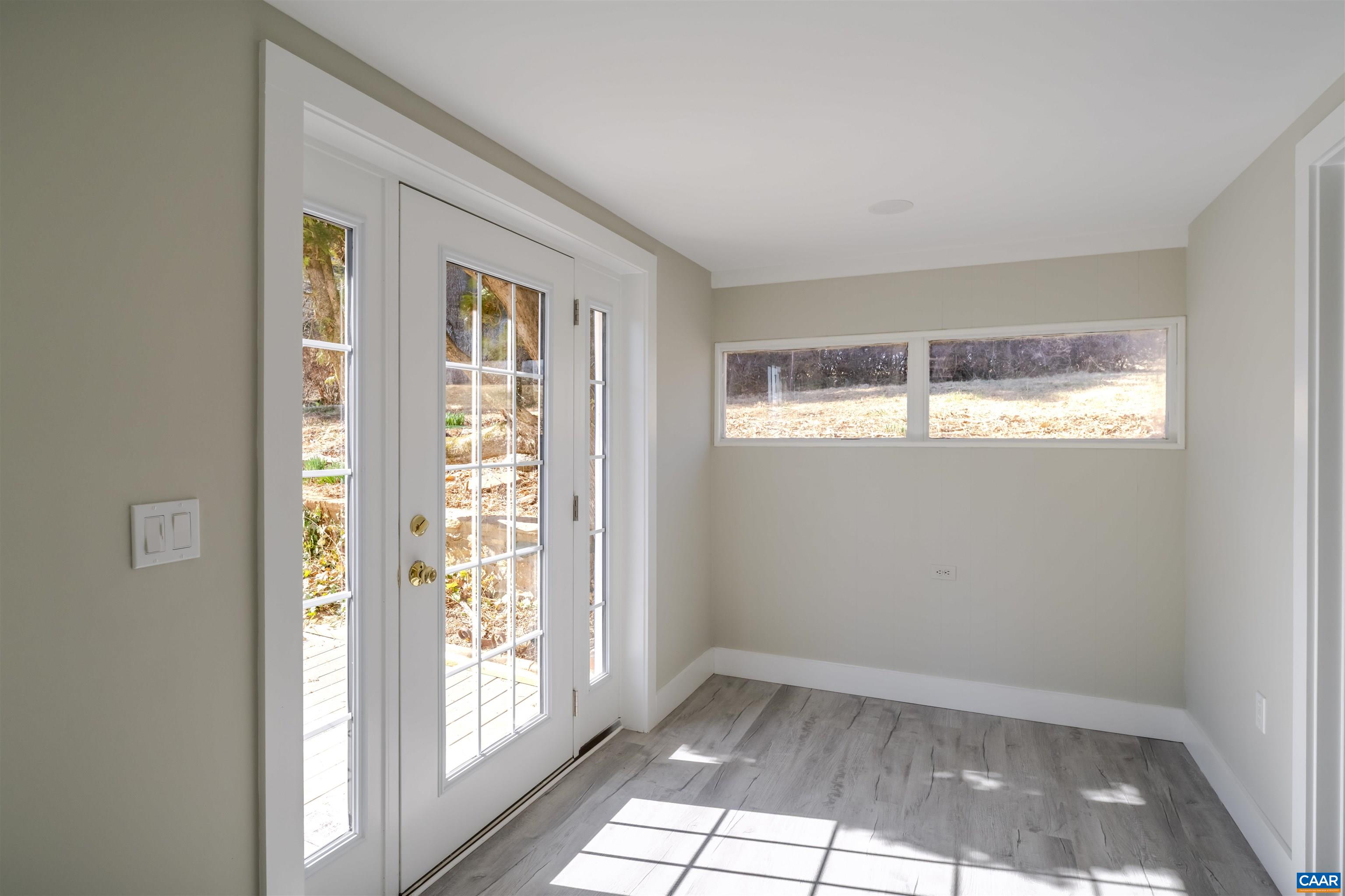 12413 Chicken Mountain Road Orange, VA 22960 - Photo 12 of 36 a view of an empty room with a window