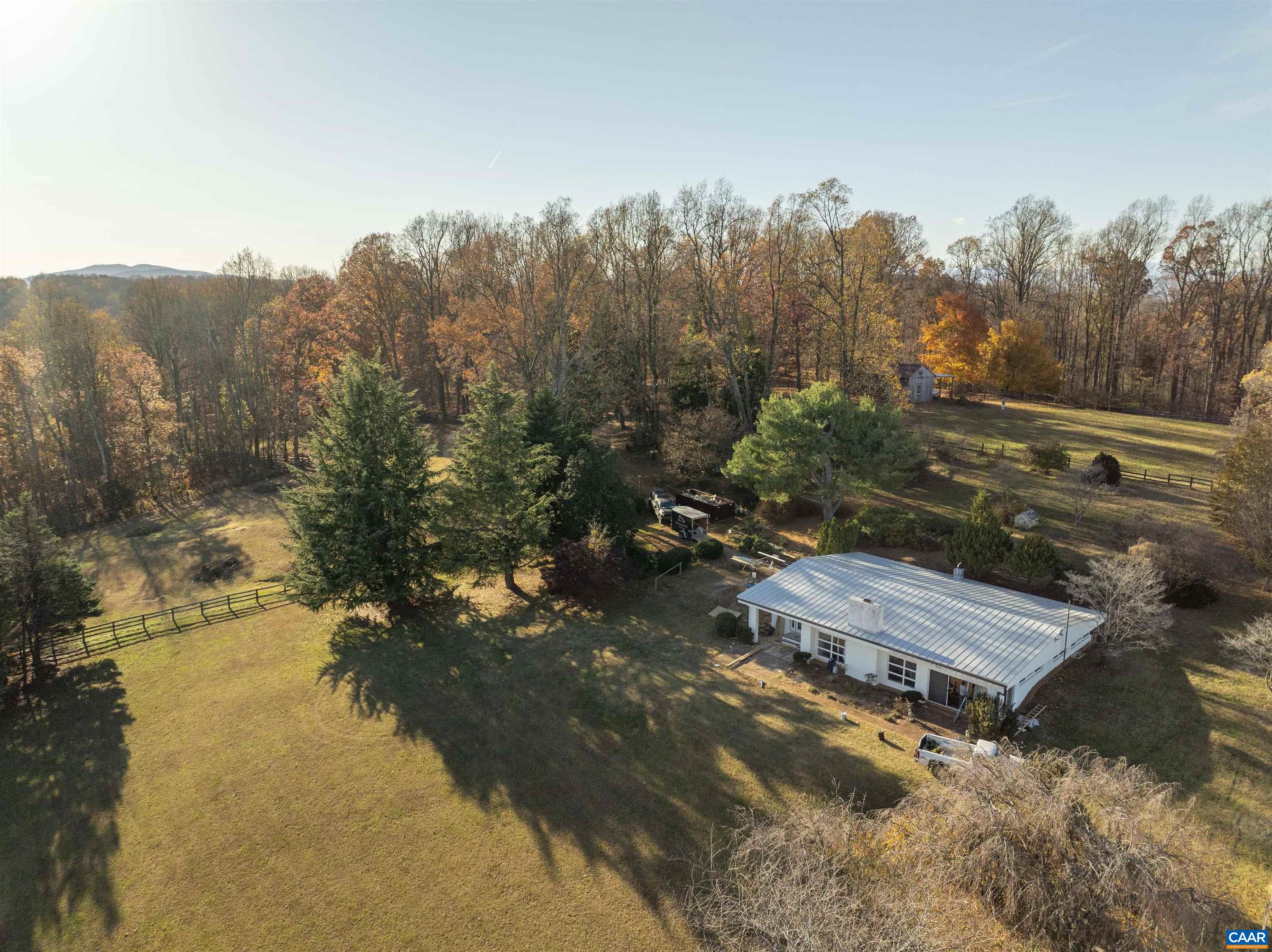 12413 Chicken Mountain Road Orange, VA 22960 - Photo 31 of 36 an aerial view of a house with a yard and lake view