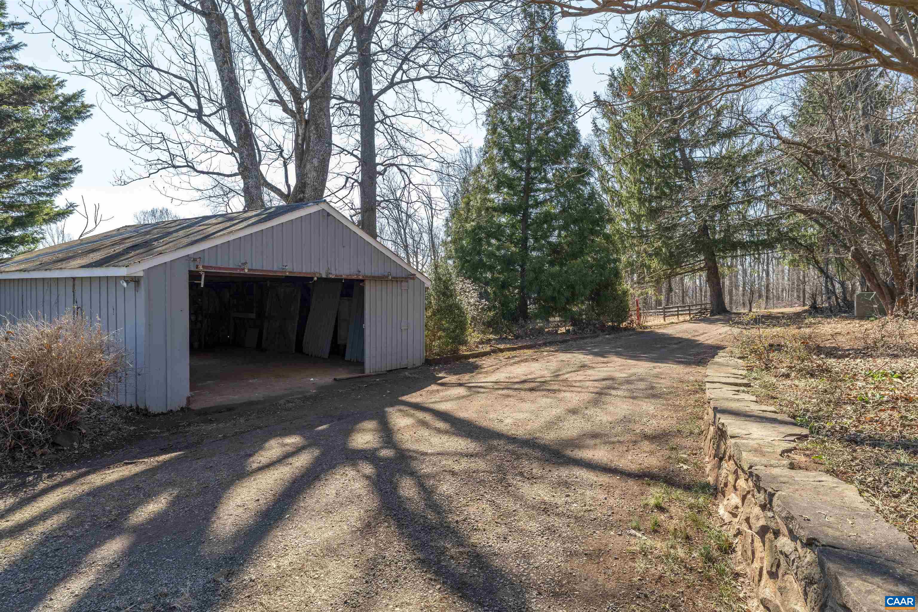 12413 Chicken Mountain Road Orange, VA 22960 - Photo 32 of 36 a front view of a house with a yard and garage