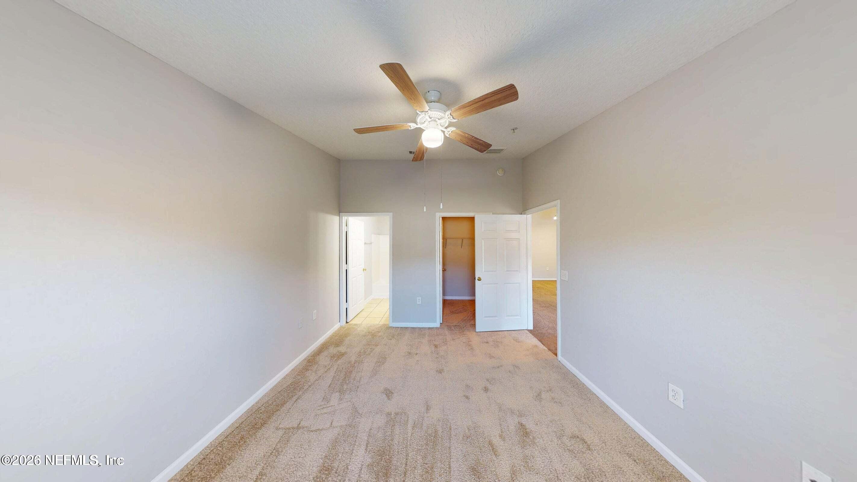 7920 Merrill Road, Unit 1509 Jacksonville, FL 32277 - Photo 6 of 11 a view of an empty room