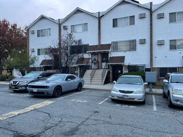 a car parked in front of a house