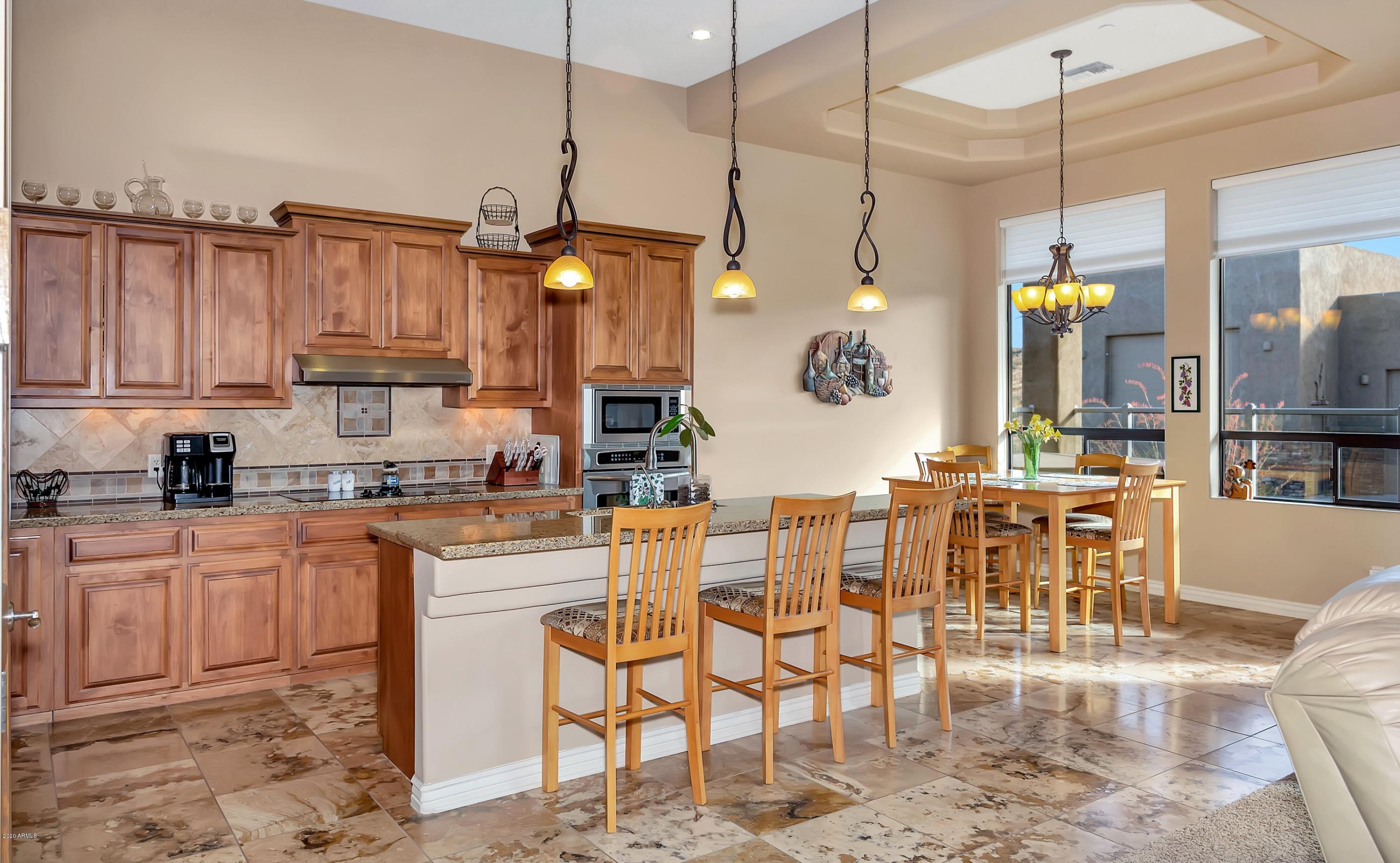 15825 East Broken Bit Road Mayer, AZ 86333 - Photo 9 of 50 009_Kitchen And Casual Dining Area