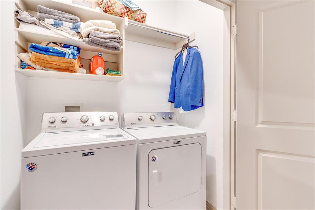 7368 Panicum Drive Frisco, TX 75033 - Photo 19 of 25 Clothes washing area featuring independent washer and dryer