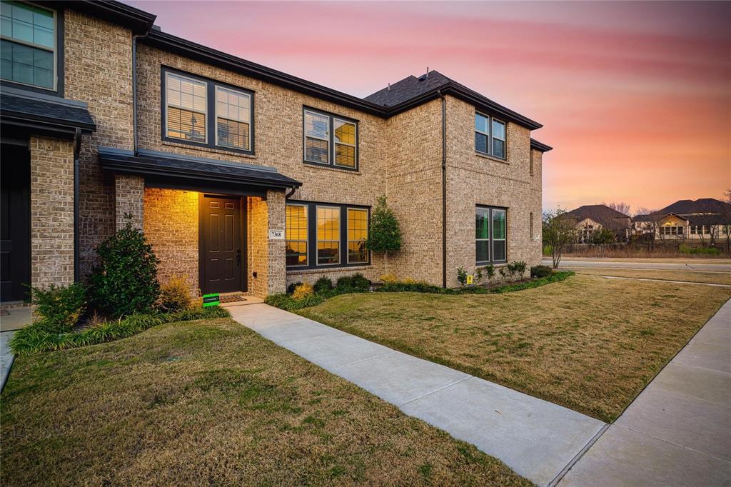 7368 Panicum Drive Frisco, TX 75033 - Photo 2 of 25 View of front of property with a lawn