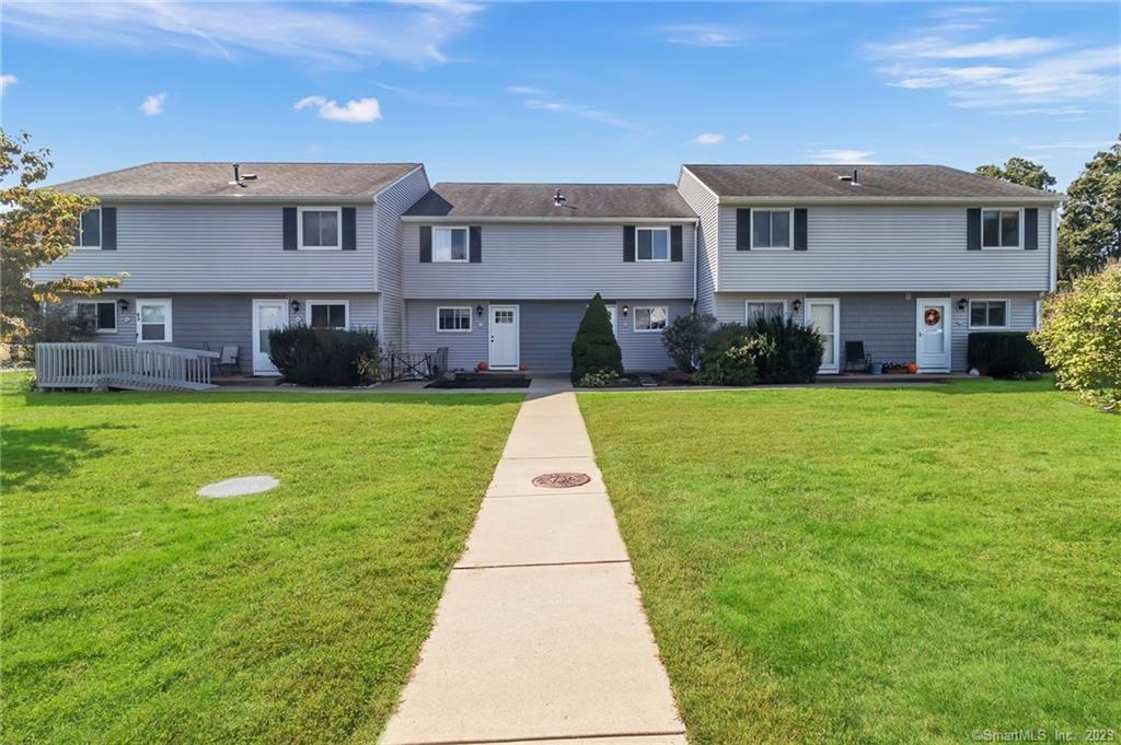 16 Seymour Road, Unit 6D East Granby, CT 06026 - Photo 1 of 1 a view of a yard in front of house