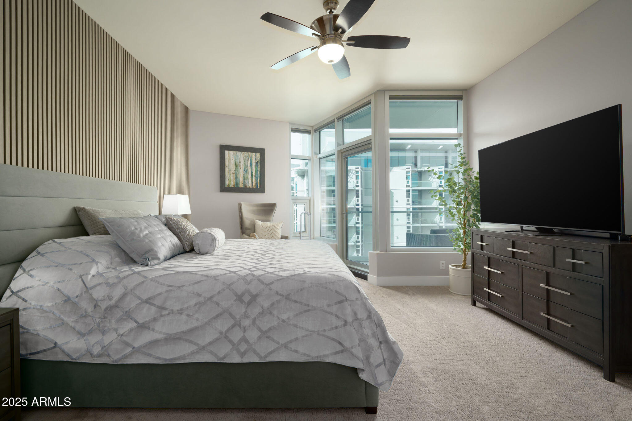 140 East Rio Salado Parkway, Unit 504 Tempe, AZ 85281 - Photo 11 of 51 a bedroom with a bed and a flat screen tv