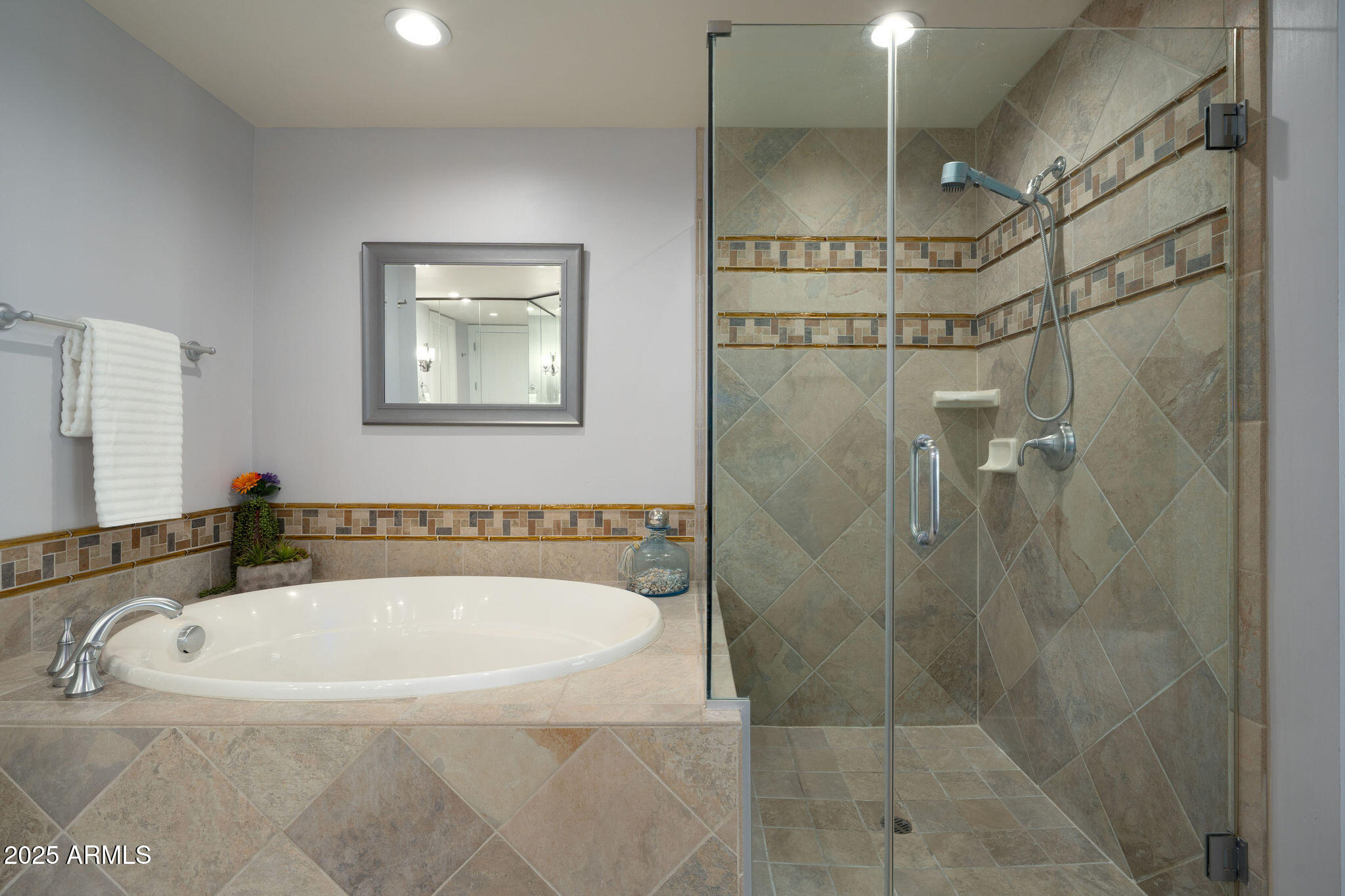 140 East Rio Salado Parkway, Unit 504 Tempe, AZ 85281 - Photo 13 of 51 a bathroom with a bathtub and shower