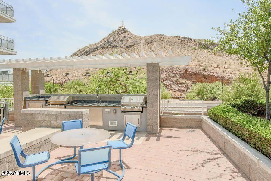 140 East Rio Salado Parkway, Unit 504 Tempe, AZ 85281 - Photo 35 of 51 a view of a chairs and table in the terrace