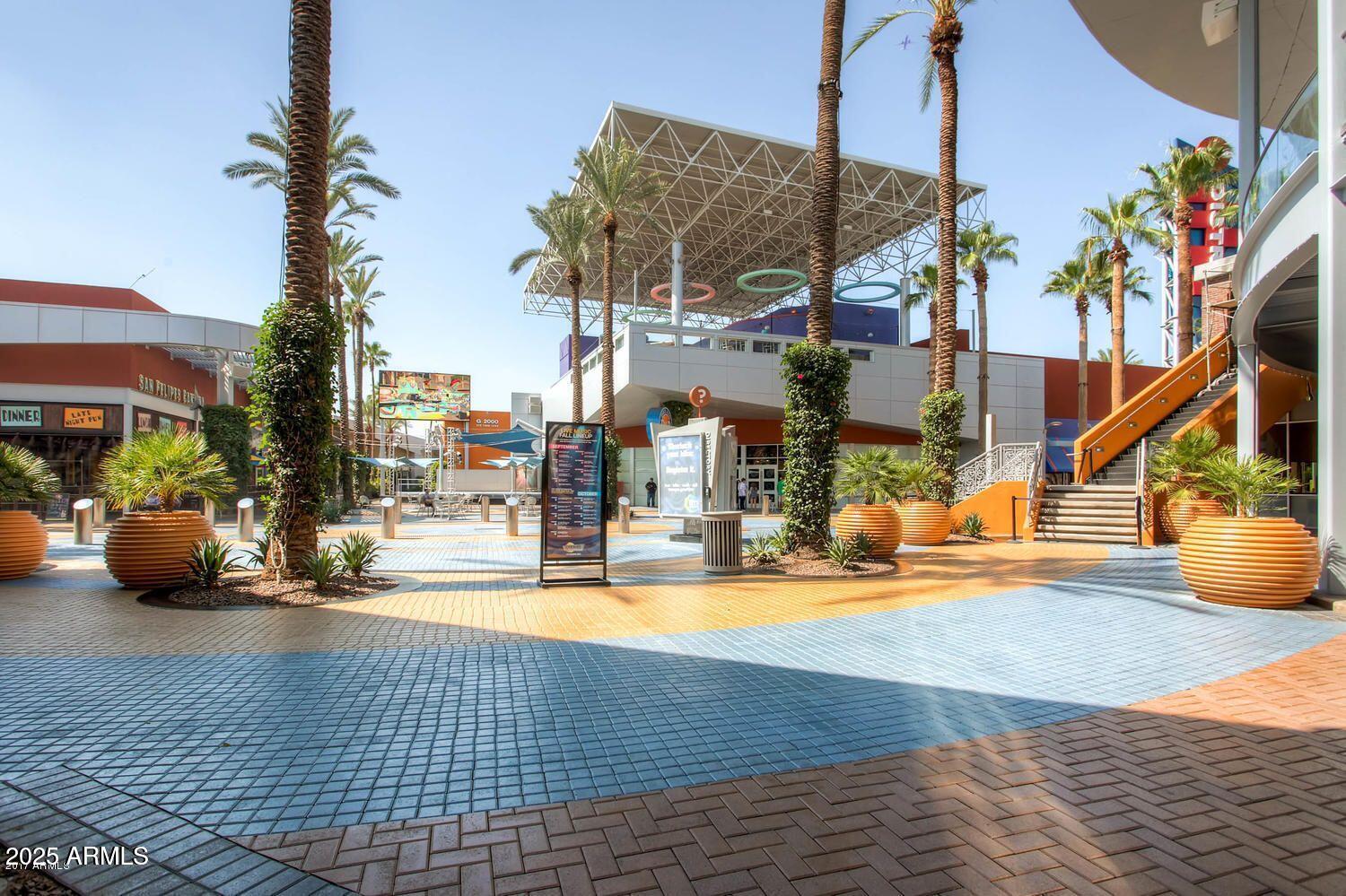 140 East Rio Salado Parkway, Unit 504 Tempe, AZ 85281 - Photo 41 of 51 a view of a swimming pool with a lounge chairs
