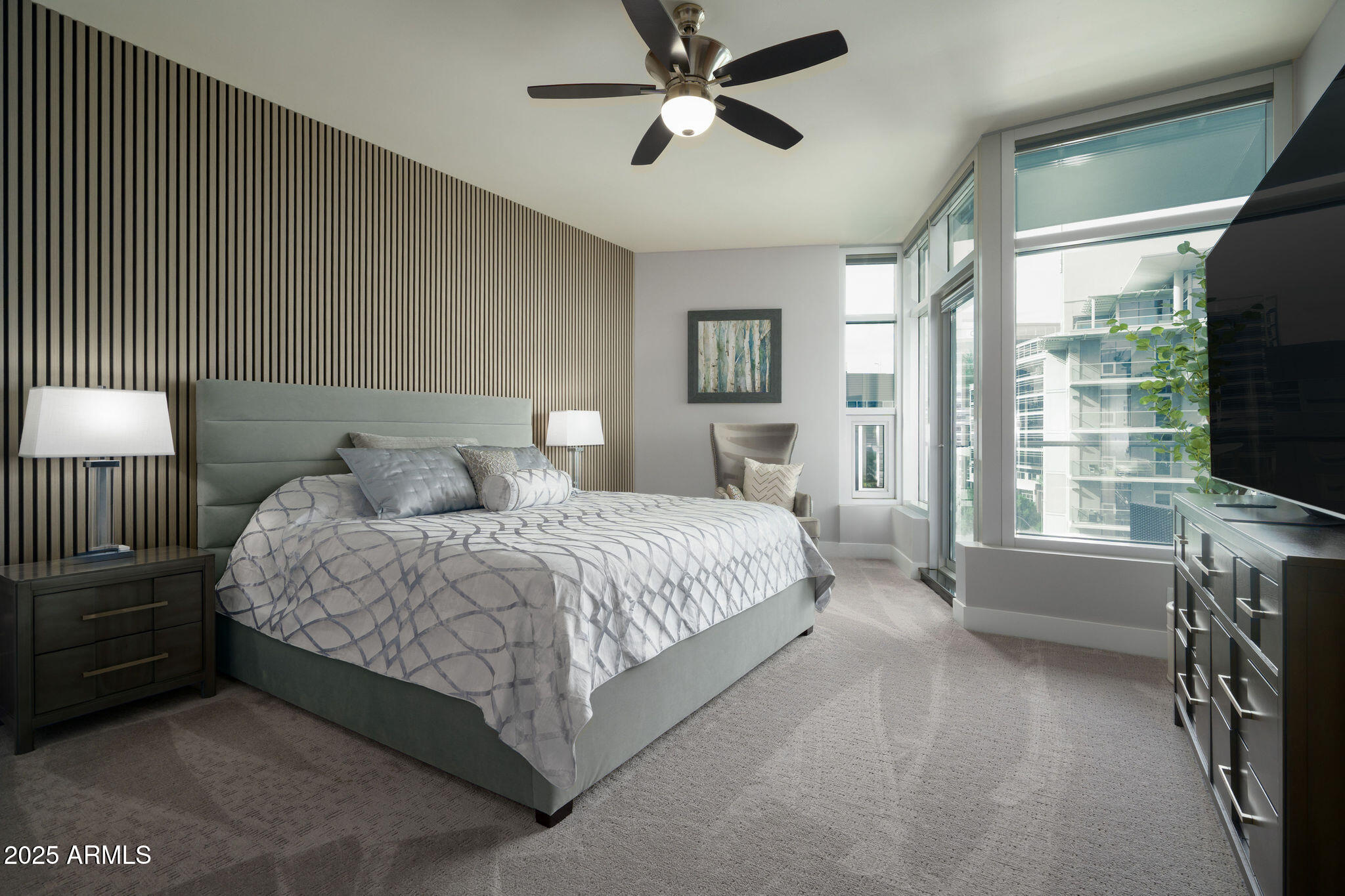 140 East Rio Salado Parkway, Unit 504 Tempe, AZ 85281 - Photo 4 of 51 a spacious bedroom with a bed and a flat screen tv