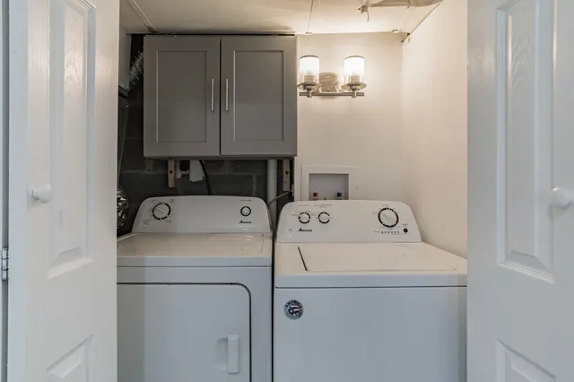 a utility room with dryer and washer