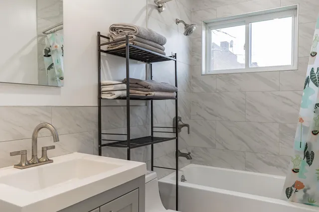 a bathroom with a sink and a bathtub