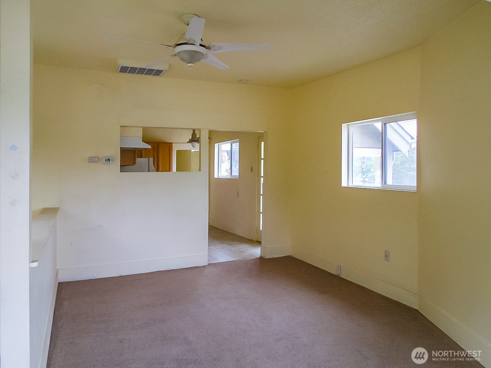 3823 Delridge Way Southwest Seattle, WA 98106 - Photo 12 of 18 an empty room with windows