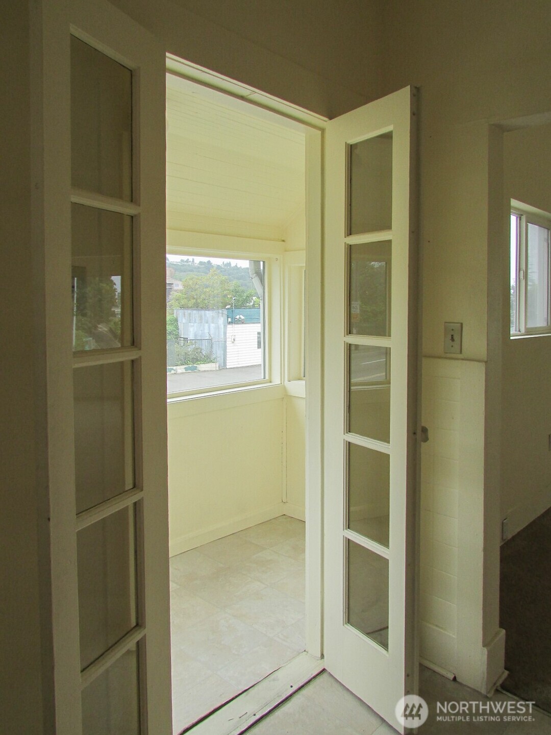 3823 Delridge Way Southwest Seattle, WA 98106 - Photo 15 of 18 a bathroom with a glass door shower and a sink