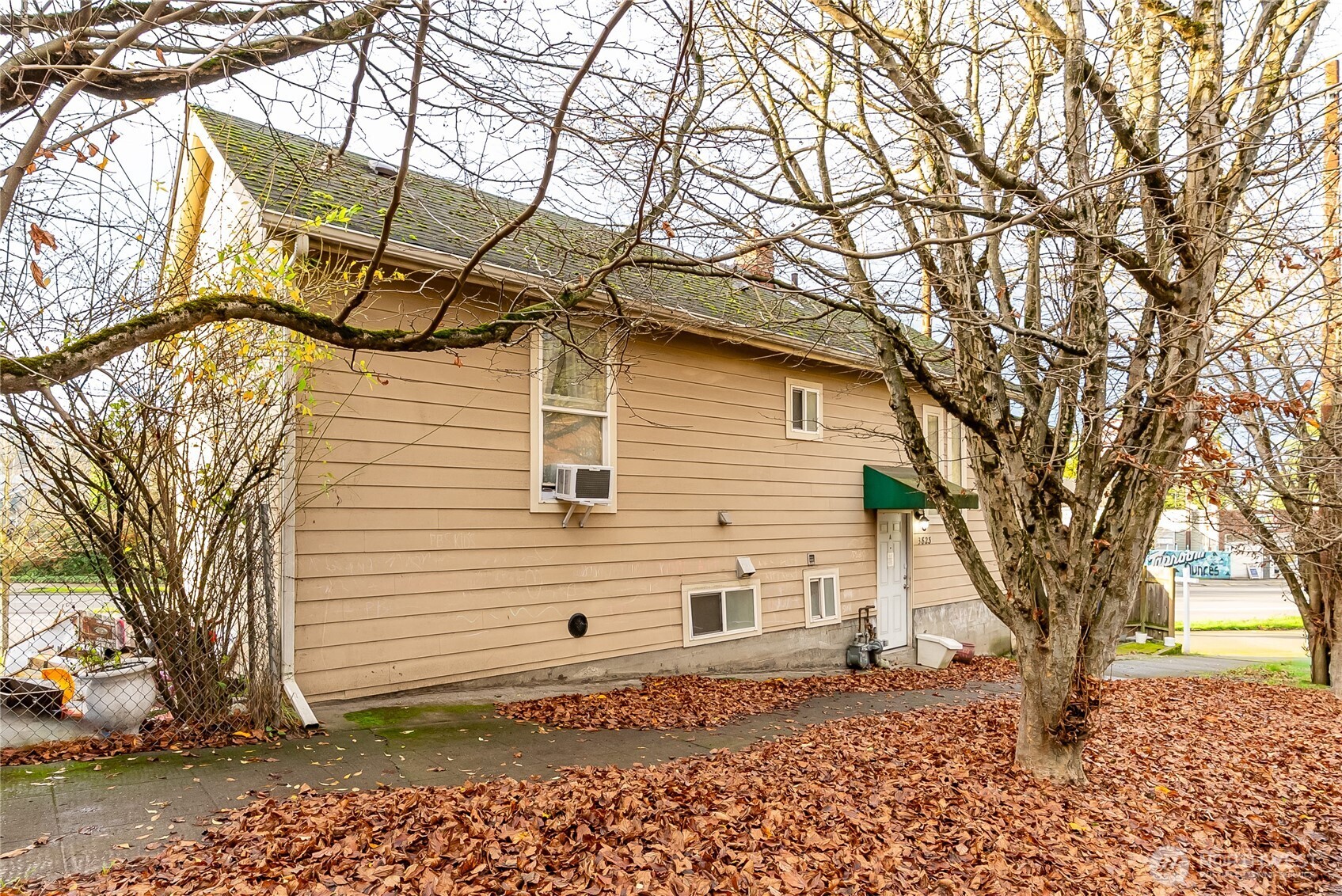 3823 Delridge Way Southwest Seattle, WA 98106 - Photo 3 of 18 a view of a house with a yard