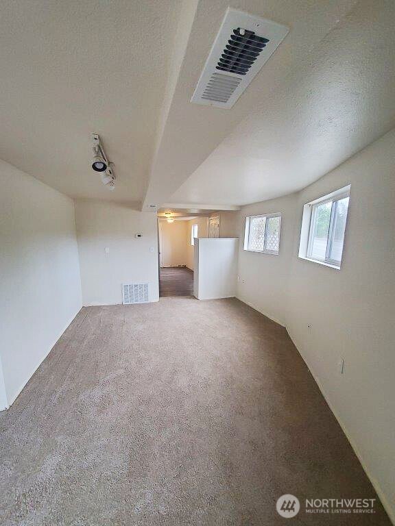 3823 Delridge Way Southwest Seattle, WA 98106 - Photo 8 of 18 a view of an empty room with a window