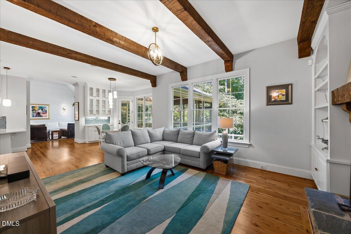 1504 Consett Court Raleigh, NC 27613 - Photo 25 of 81 Family room with beams