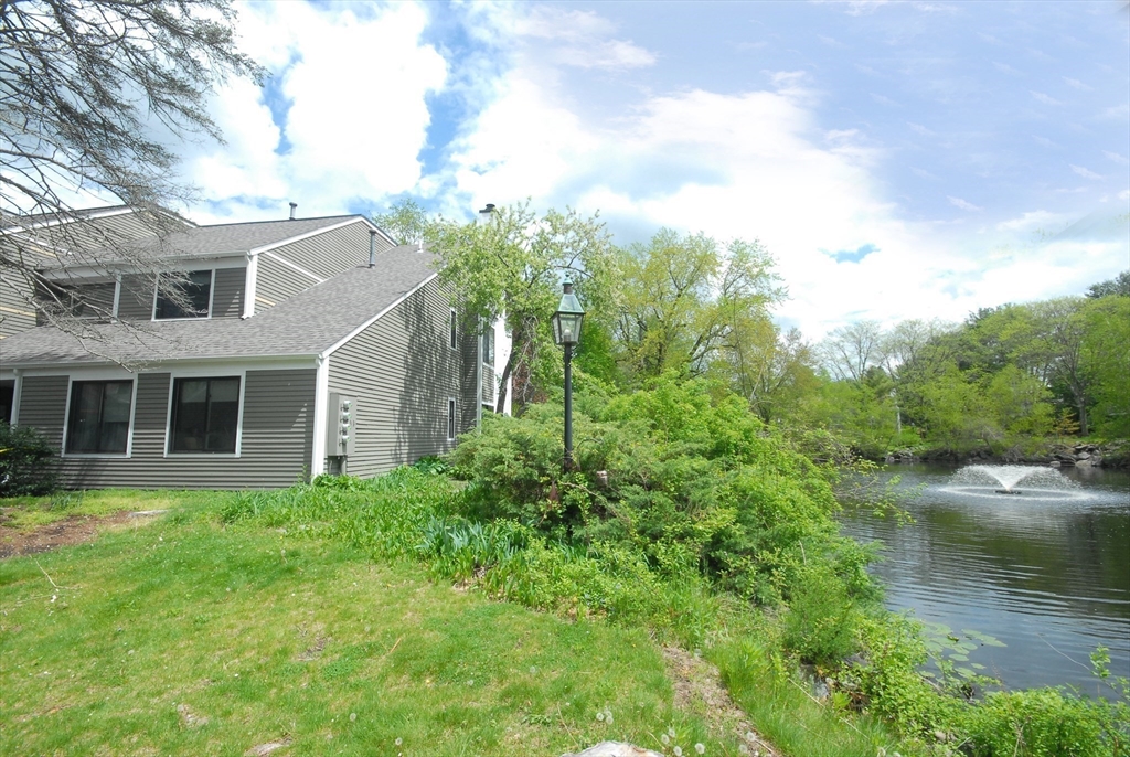 18 Concord Greene, Unit 6 Concord, MA 01742 - Photo 24 of 24 a view of a house with a yard