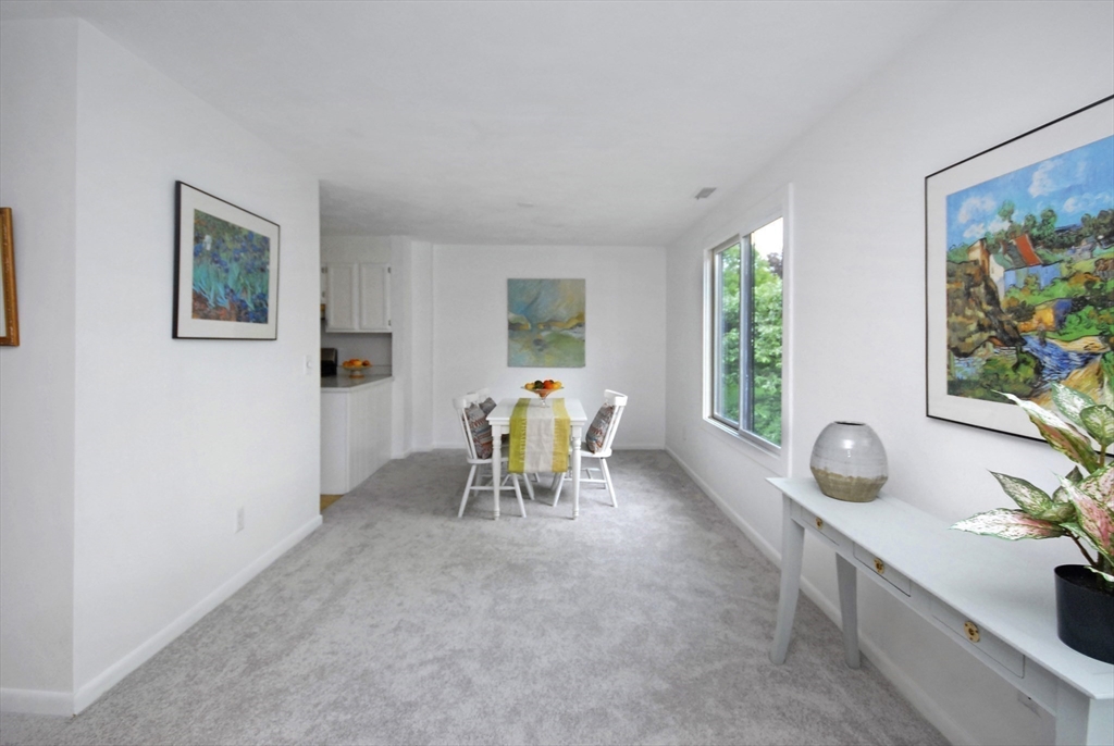 18 Concord Greene, Unit 6 Concord, MA 01742 - Photo 7 of 24 a dining room with furniture and window
